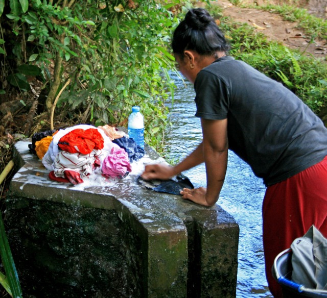 Woman washing laundry