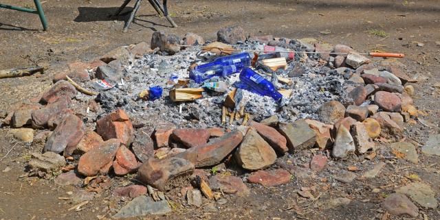 fire pit with empty bottles